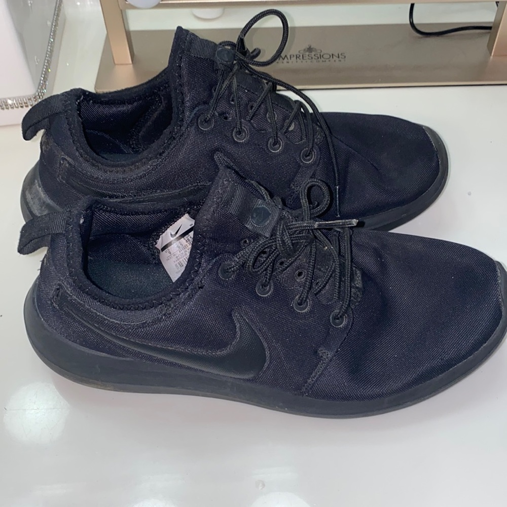Nike black shoe. Women’s size 9.
